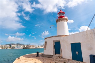 Holiday coastal Ibiza town lighthouse from Al Faro