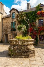 Water well in the square of the medieval village of Rochefort-en-Terre