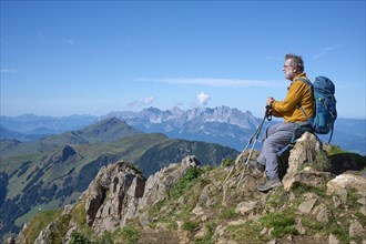 Hiker enjoying the view of the Wilder Kaiser from Wildseeloder