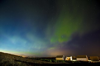 Green lights of the beautiful Northern Lights on the Reykjanes peninsula in southern Iceland