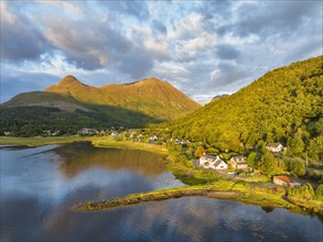 Aerial view of the freshwater loch Loch Leven with the former Pier House in Glen Coe Village