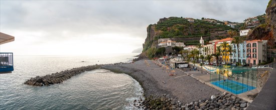 Panoramic and aerial view of Ponta do Sol beach in the east of Madeira in summer