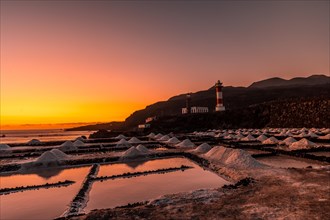 Sunset at the Fuencaliente Lighthouse on the route of the volcanoes south of the island of La Palma