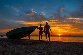 A couple in love at Roatan Sunset from West End. Honduras