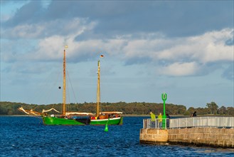 Traditional sailing boat in front of the pier at the Utkiek viewpoint in the fishing village of Wieck