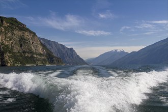 Stern waves of an excursion steamer on Lake Garda