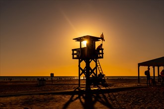 Guard post in the summer sunset on the Bateles beach in Conil de la Frontera