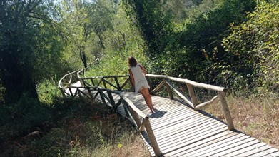 A young tourist in summer visiting the beautiful natural park of Donana. Huelva