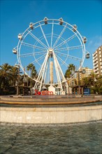 A Ferris wheel in the Plaza de las Velas on the Rambla de Almeria