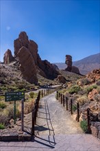Path between the Roques de Gracia and the Roque Cinchado in the natural area of Mount Teide in Tenerife