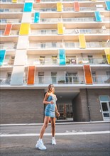 Girl with a skirt enjoying the city in summer