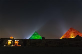 Sound and light show at the beautiful pyramids and sphinx of Giza. Night in the city of Cairo. Africa
