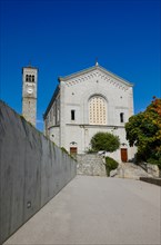 Church and Tower Santa Lucia and Walkway Against Blue Clear Sky in a Sunny Day in Massagno