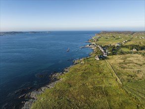 Aerial view of the Isle of Iona and the ferry terminal in the morning light