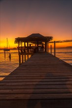 Beautiful sunset on a beach on Roatan Island. Honduras