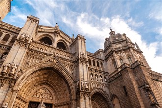 Facade of Santa Iglesia Catedral Primada in the medieval city of Toledo in Castilla La Mancha