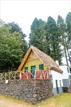 Traditional Madeiran house like those of Santana in the forest of Caldeirao Verde