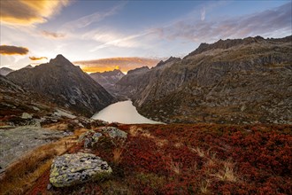 Autumn atmosphere at Lake Grimsel in the Swiss Alps with Zinggenstock