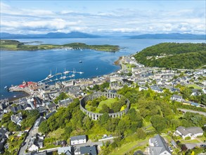 Aerial view of the harbour town of Oban with McCaig's Tower