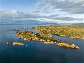 Aerial view of the coastline of the Ross of Mull peninsula with small islands