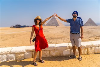 A tourist couple at The Pyramids of Giza