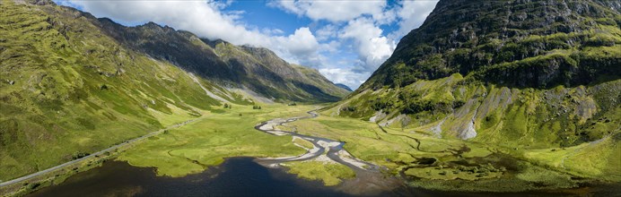 Aerial panorama of the western part of Glen Coe with the freshwater loch Loch Achtriochtan and the River Coe flowing into it