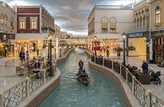 Gondola ride on indoor canal at Villaggio Mall