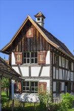 Half-timbered house with brick chimney in the Swabian Open Air Museum