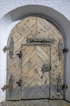 Old wooden gate at Marienberg Abbey
