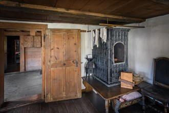 Parlour with tiled stove in the Swabian Open Air Museum