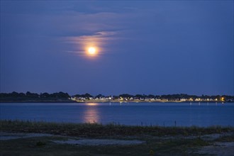 Full moon over the bay of Plouharnel in Brittany. Morbihan