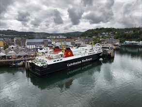 Aerial view of the port town of Oban with the ferry MV Isle of Lewis operating a scheduled service between Oban and Isle of Barra