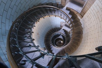 Spiral staircase inside the Phare d'Eckmuehl lighthouse in Penmarch. Brittany