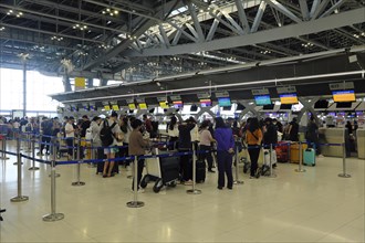 Passengers at the Singapore Airline counter