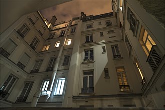 Night view of the inner courtyard of a hotel building