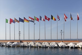 Boat harbour with flags of European countries