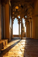 Sunset detail from the Arab doors of a courtyard of the Alcazaba in the city of Malaga
