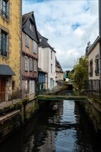 Traditional wooden houses by the river in the medieval town of Quimper in the department of Finisterre. French Brittany
