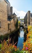 Traditional wooden houses by the river in the medieval town of Quimper in the department of Finisterre. French Brittany