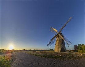 Windmill Auf der Hoechte at sunset is part of the Westphalian Mill Road and is located in Hille