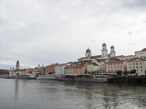 View over the Danube to the old town with the town hall and the cathedral