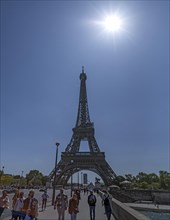 Eifel Tower with sun against the light