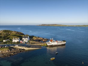 Aerial view of the Fionnphort ferry terminal with the ferry MV Loch Buidhe of the shipping company Caledonian MacBrayne operating a scheduled service between Fionnphort and the Isle of Iona