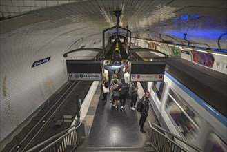 Metro station Louis Blanc with arriving Metro