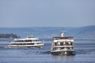 The excursion boats ST. GALLEN and KARLSRUHE underway on Lake Constance against the backdrop of Birnau Abbey