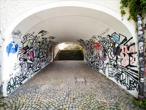 Graffiti on the wall of a passageway