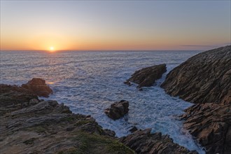 Sunset on the Cote Sauvage. The Wild Coast is a rocky coast to the west of the Quiberon peninsula in Brittany. Cores