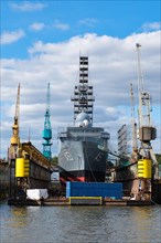 Warship in the shipyard in the port of Hamburg