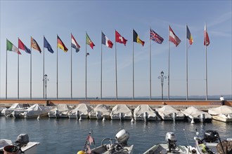 Boat harbour with flags of European countries