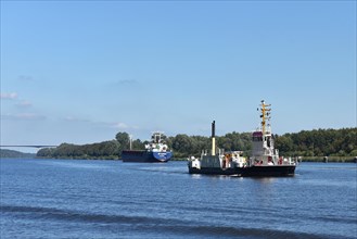 Ferry and cargo ship in the Kiel Canal